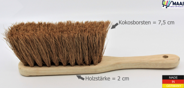 Hand brush with coconut placement